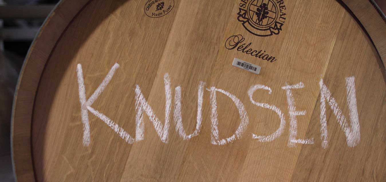 wine barrel with knudsen written on it