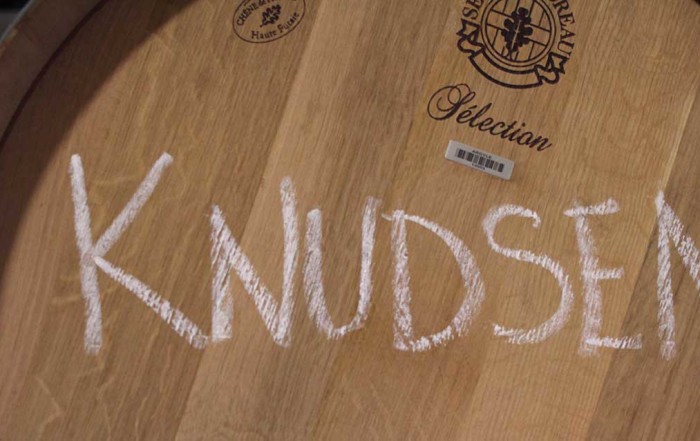 wine barrel with knudsen written on it
