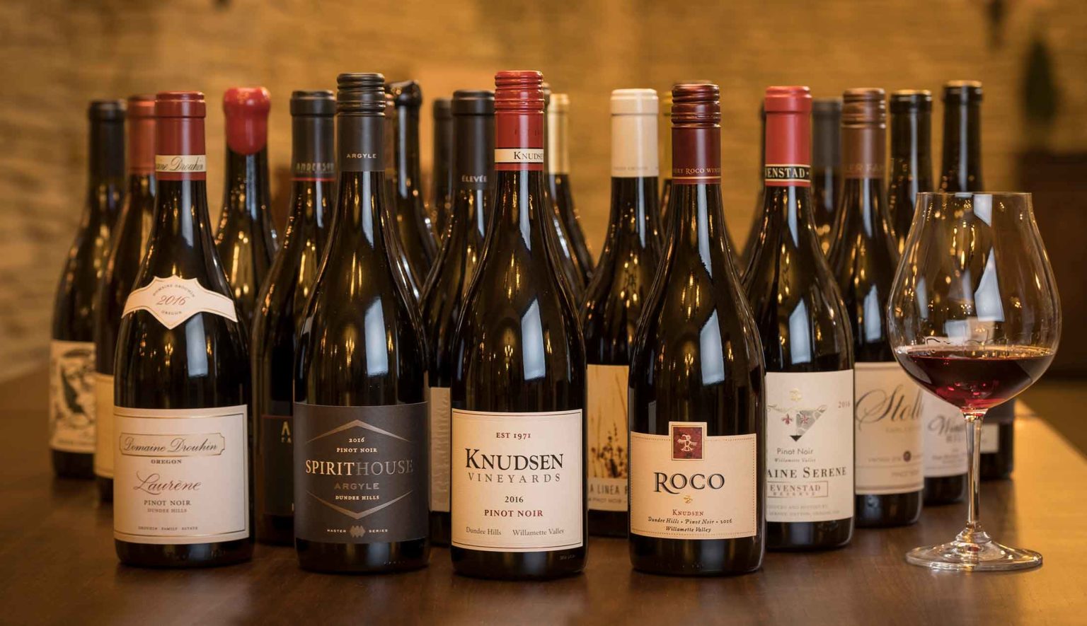 photo of many bottles of wine on a table